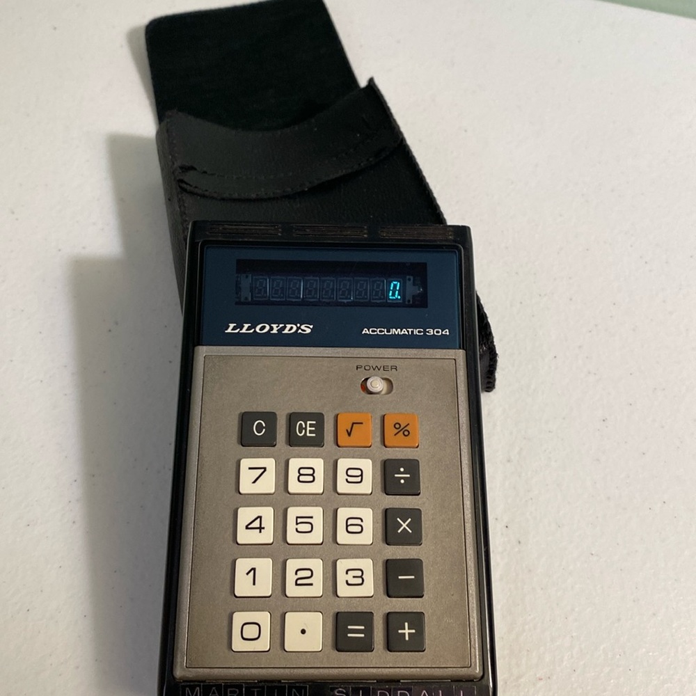 Vintage Lloyd’s Accumatic 304 Calculator with Case